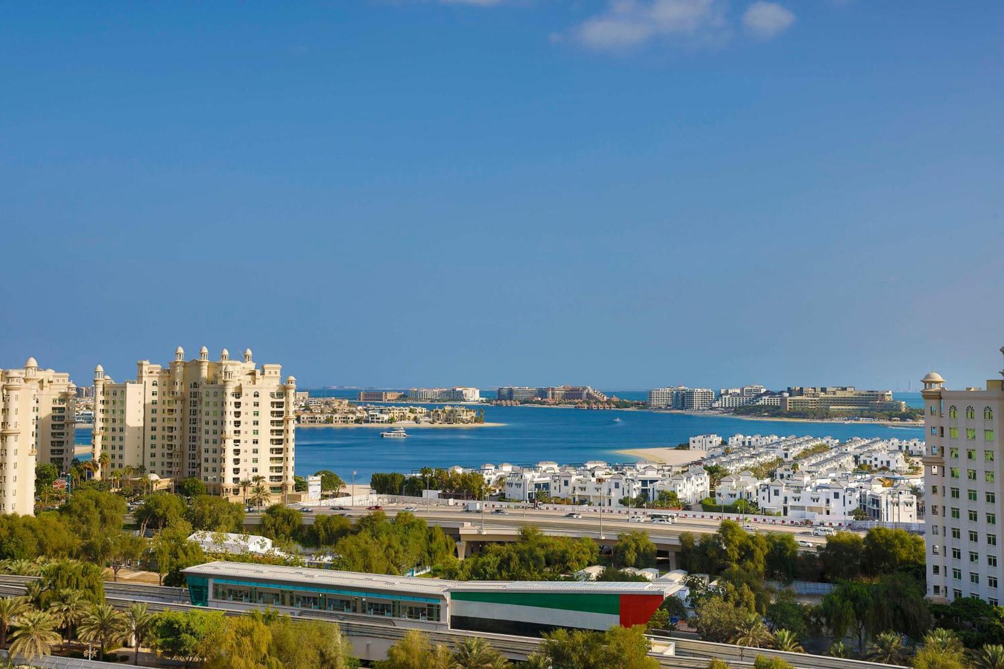 Tumbi West Palm Beach Hotel Dubai,Tapestry Collection Hilton ภายนอก รูปภาพ