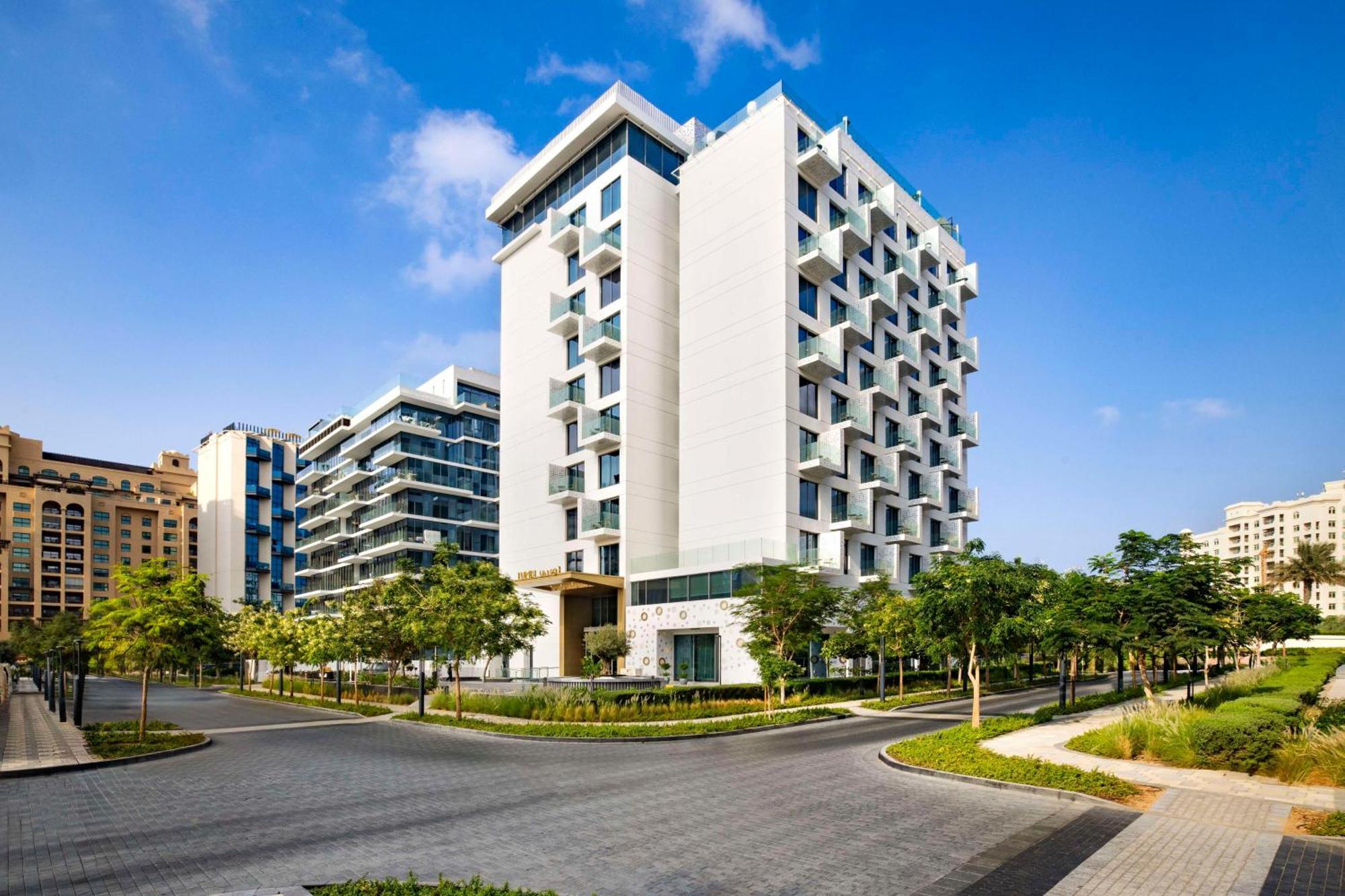 Tumbi West Palm Beach Hotel Dubai,Tapestry Collection Hilton ภายนอก รูปภาพ